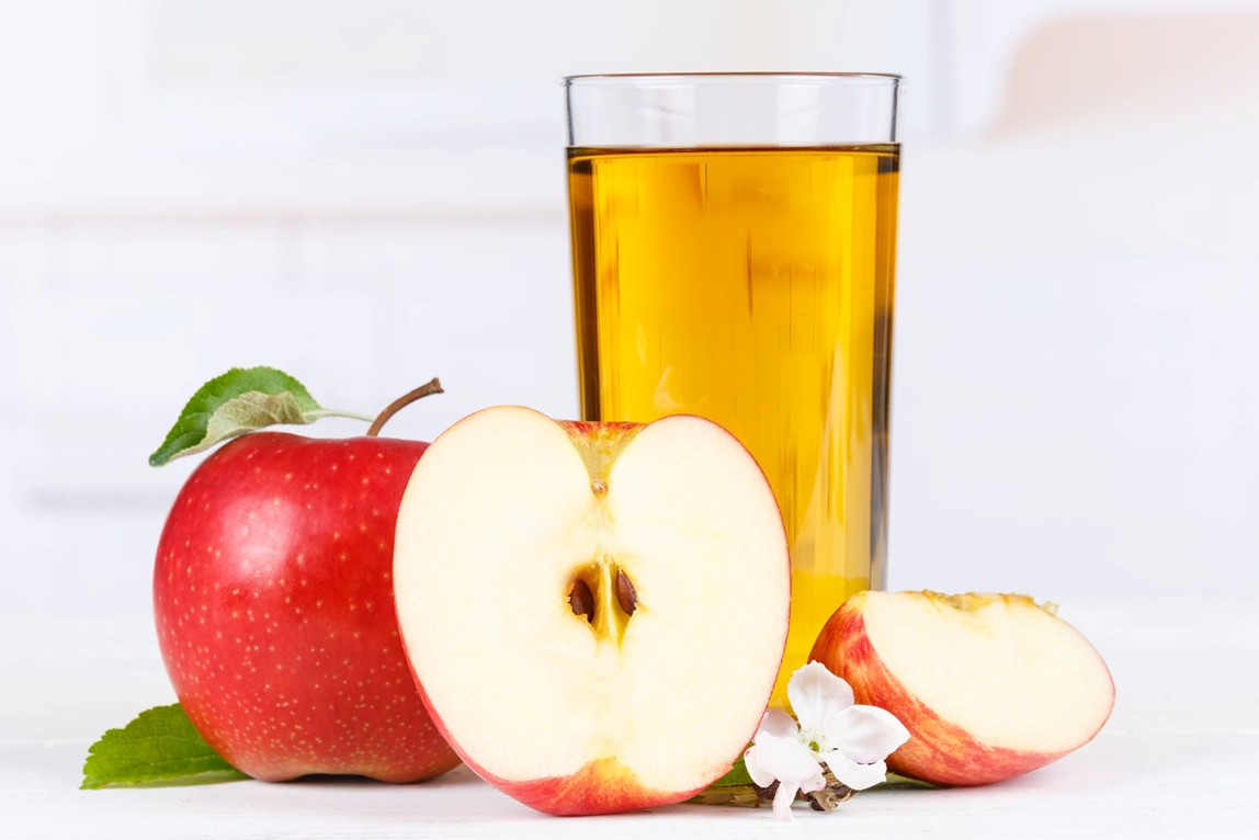 Apples and a glass of apple juice